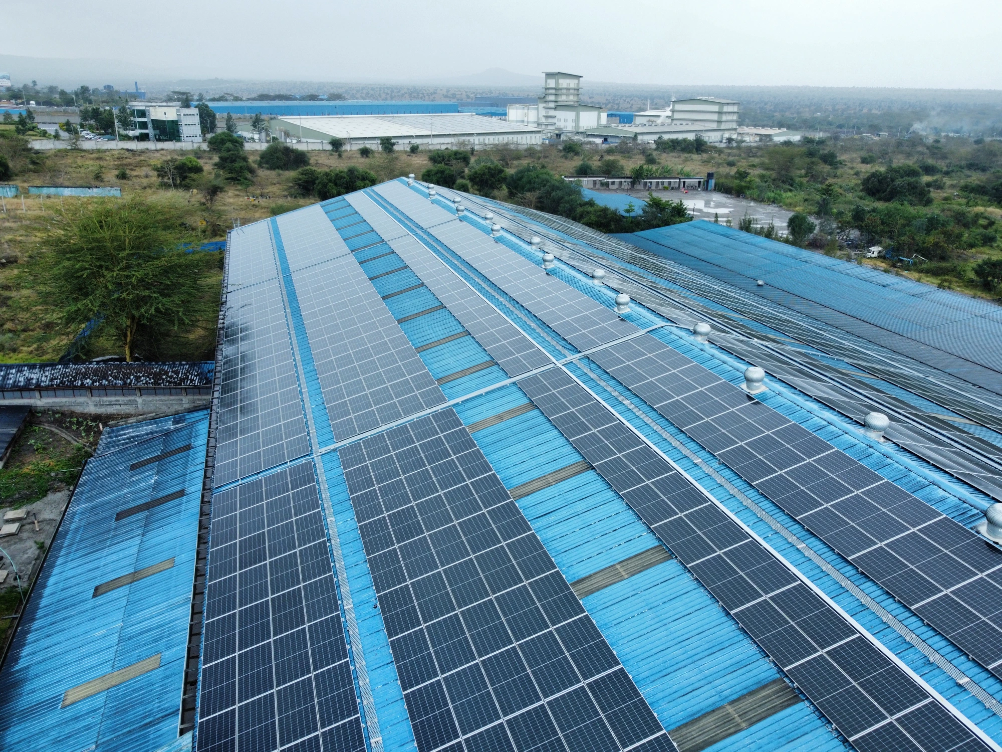 Devki Group — rooftop solar array across the factory complex
