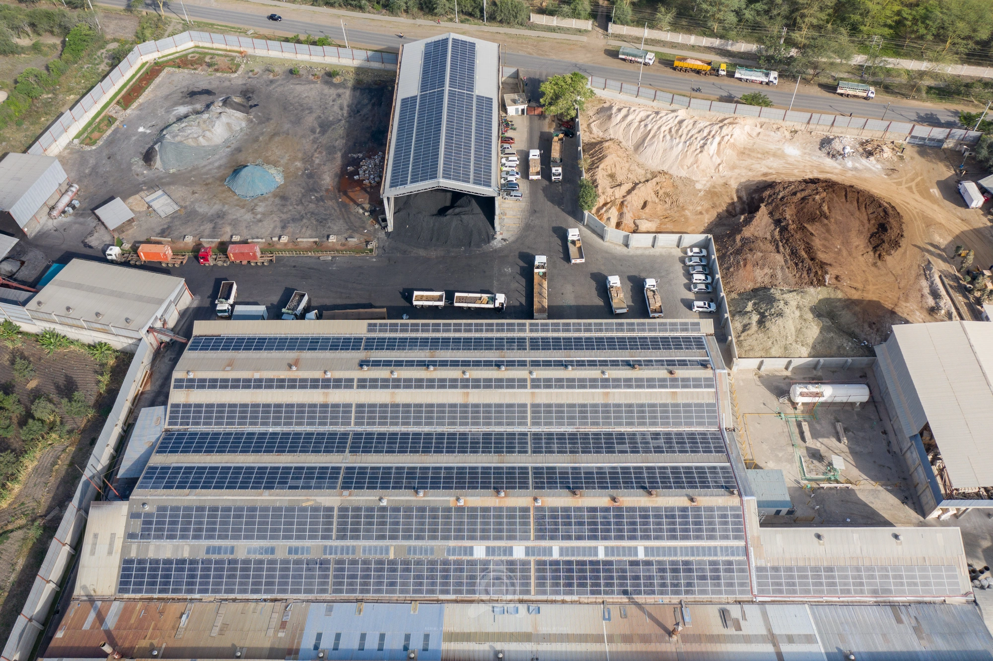 SAJ Ceramics — site overview with both solar roofs